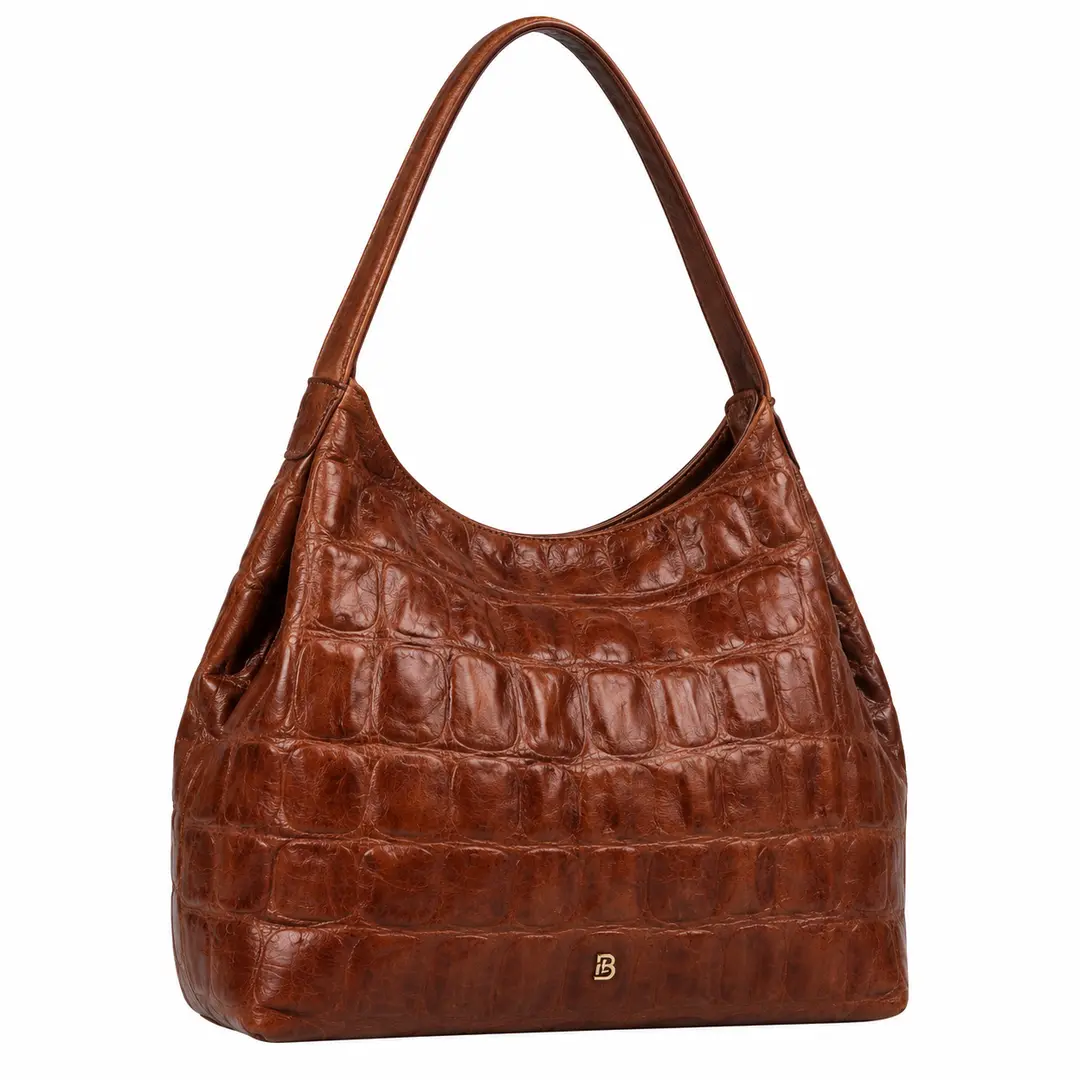Belluga Croco Classy cognac schoudertas met krokodillenreliëf, ruim hobo-model en goudkleurig logo.