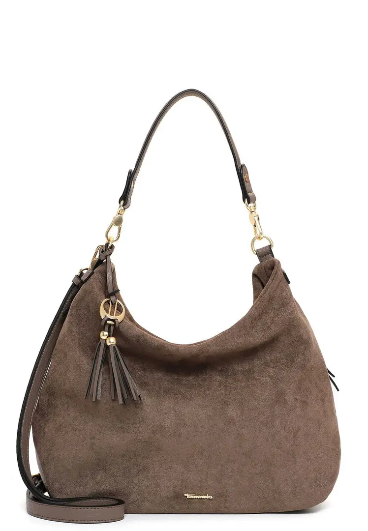 Tamaris taupe dames schoudertas in suède-look met goudkleurige details en decoratieve kwast.